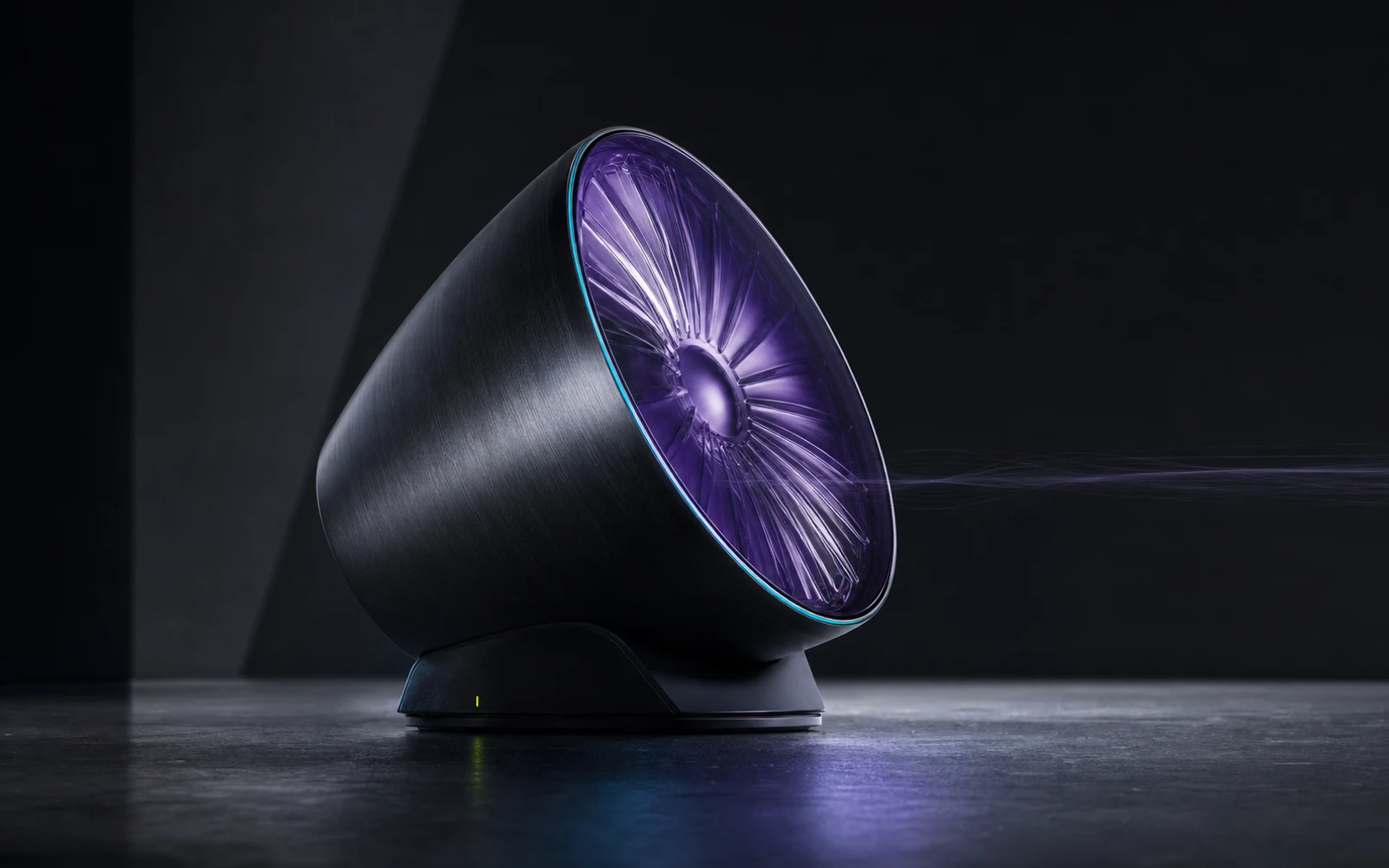 A sculptural dark aluminum speaker with a translucent violet acoustic membrane in a charcoal studio.