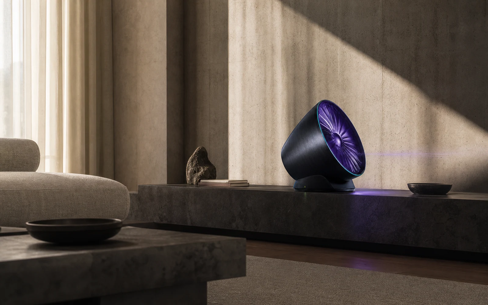The fictional Morrow Audio speaker placed in a warm, restrained concrete listening room.